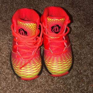 Bright orange, yellow & black Adidas sneakers